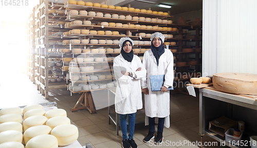 Image of business woman team in local cheese production company