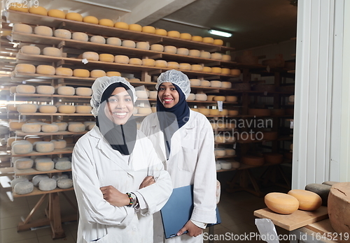 Image of business woman team in local cheese production company