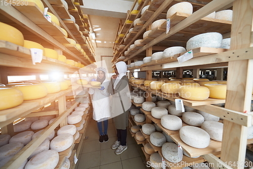 Image of business woman team in local cheese production company