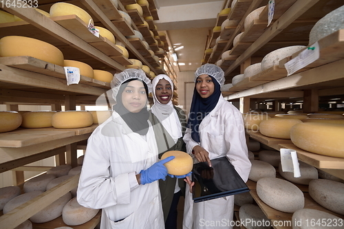 Image of business woman team in local cheese production company