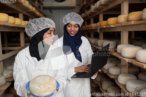 Image of business woman team in local cheese production company