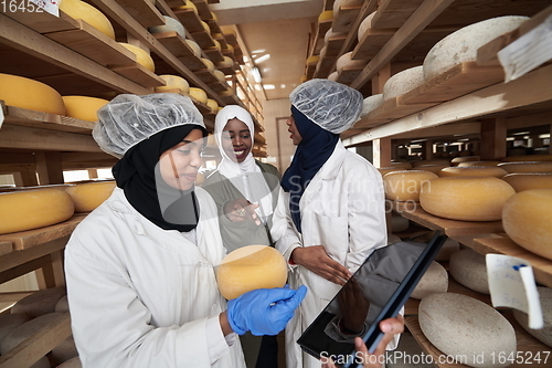 Image of business woman team in local cheese production company