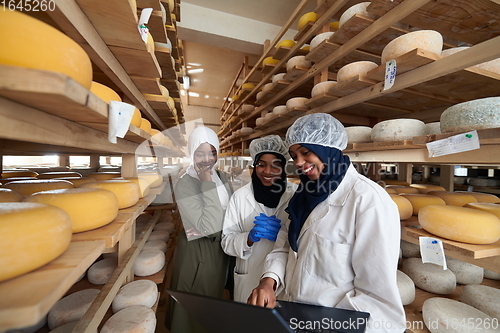 Image of business woman team in local cheese production company