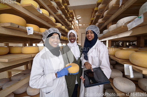 Image of business woman team in local cheese production company