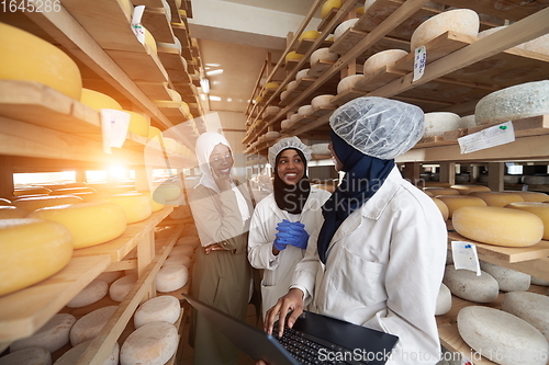 Image of business woman team in local cheese production company