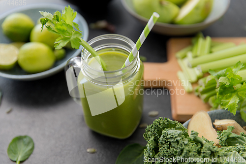Image of close up of glass mug with green vegetable juice