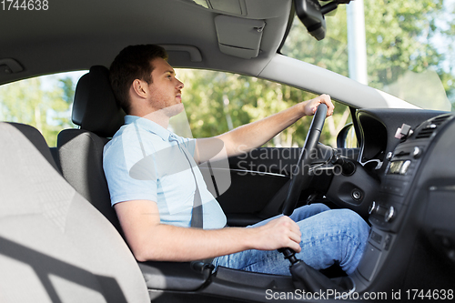 Image of man or driver driving car in summer