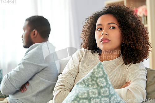 Image of unhappy couple having argument at home