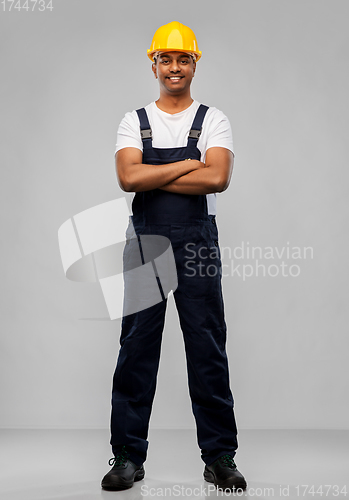 Image of happy indian worker or builder with crossed arms