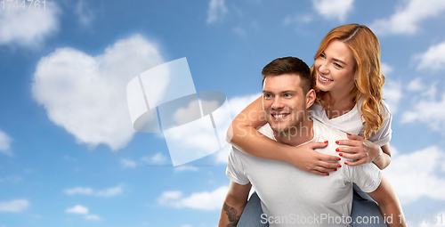 Image of happy couple in white t-shirts having fun