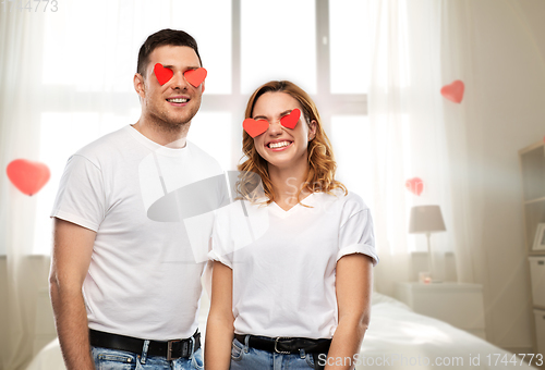 Image of happy couple with red hearts instead of eyes