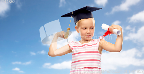 Image of little girl in mortarboard with diploma