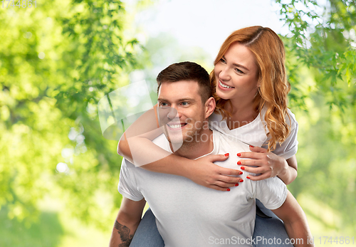 Image of happy couple in white t-shirts having fun