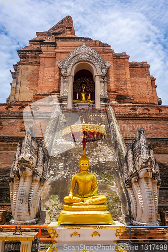 Image of Gold Buddha, Wat Chedi Luang temple big Stupa, Chiang Mai, Thail