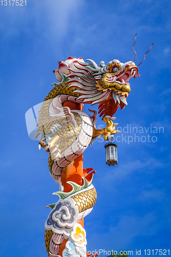 Image of Dragon statue in Wat Phanan Choeng, Ayutthaya, Thailand