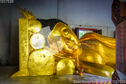 Image of Buddha statue in Wat Phra Singh temple, Chiang Mai, Thailand