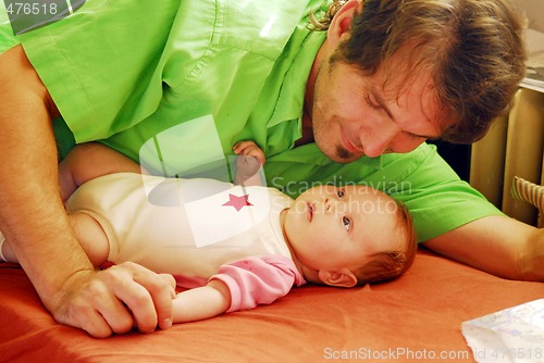 Image of Baby and father