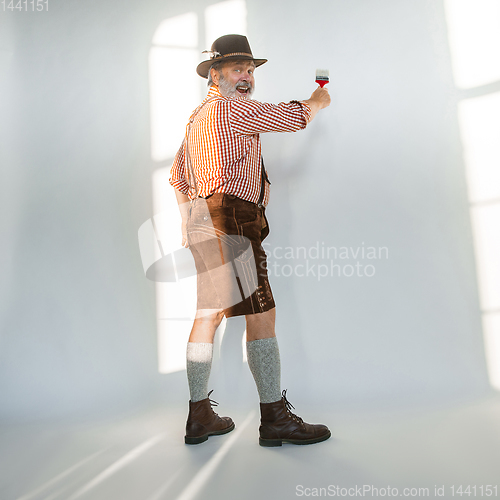 Image of Portrait of Oktoberfest man, wearing the traditional Bavarian clothes