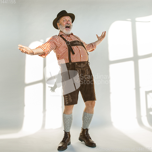 Image of Portrait of Oktoberfest man, wearing the traditional Bavarian clothes