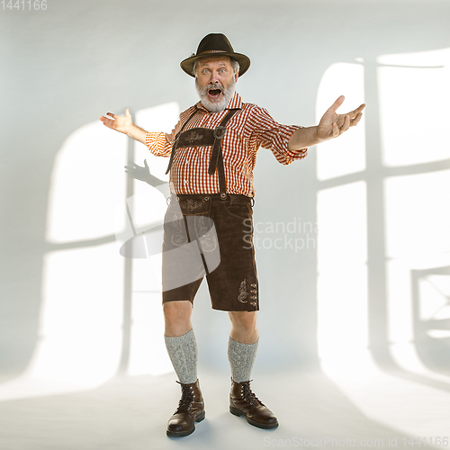 Image of Portrait of Oktoberfest man, wearing the traditional Bavarian clothes