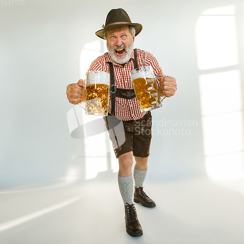 Image of Portrait of Oktoberfest man, wearing the traditional Bavarian clothes