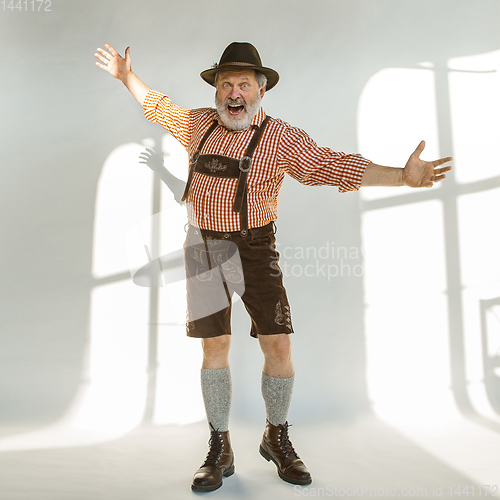 Image of Portrait of Oktoberfest man, wearing the traditional Bavarian clothes