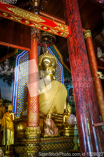 Image of Buddha statue in Wat Chomphu temple, Chiang Mai, Thailand