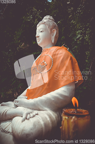 Image of Buddha statue in jungle, Wat Palad, Chiang Mai, Thailand