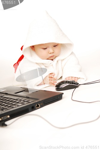 Image of Baby and notebook