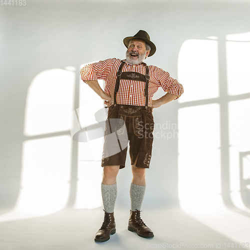 Image of Portrait of Oktoberfest man, wearing the traditional Bavarian clothes