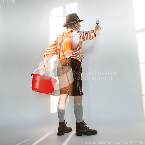 Image of Portrait of Oktoberfest man, wearing the traditional Bavarian clothes