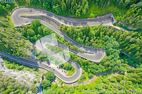 Image of Above view of serpentine forest road