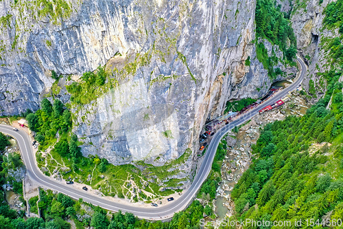 Image of Above view of narrow road near rock