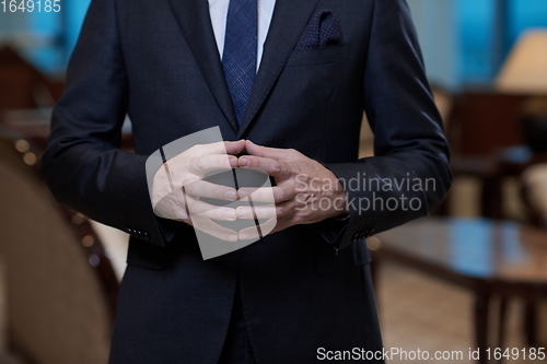 Image of corporate business man hands closeup