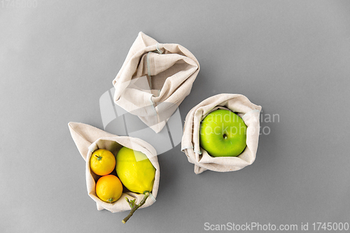 Image of fruits in reusable canvas bags for food shopping