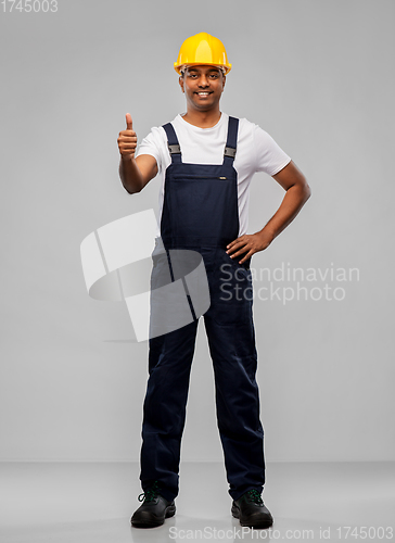 Image of happy indian worker or builder showing thumbs up