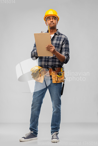 Image of thinking builder with clipboard and pencil