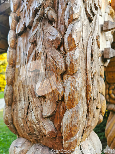 Image of Close image of wooden pillar sculpture