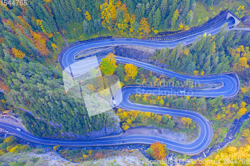 Image of Rocky forest mountain road in autumn