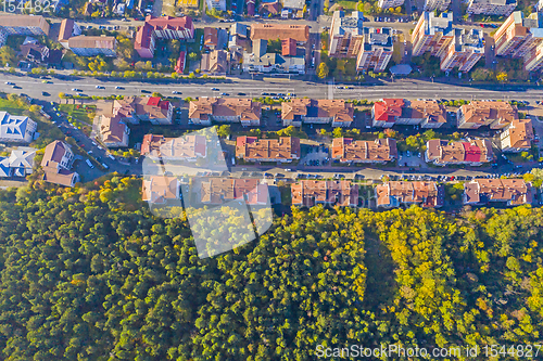 Image of Residential buildings  near forest viewed from above