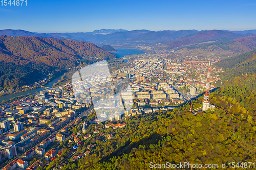 Image of Aerial view of autumn mountain city