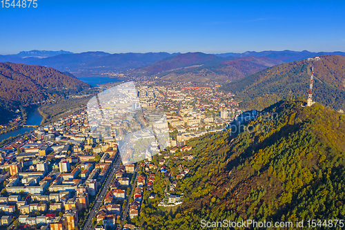 Image of Aerial view of mountain city in autumn