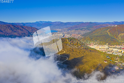Image of Fog comming over mountain city