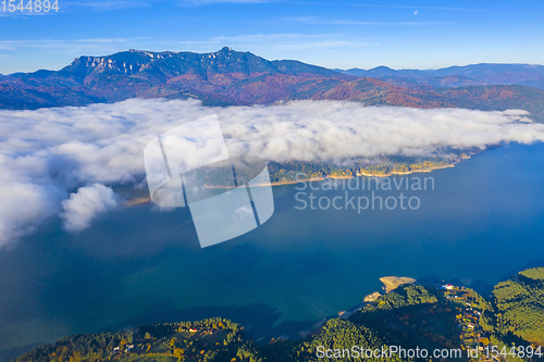 Image of Floating mist cloud in autumn landscape
