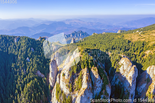 Image of Aerial view of rocky mountain in autumn