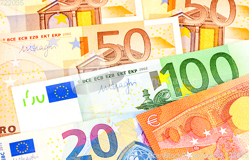 Image of Background from different euro banknotes close up