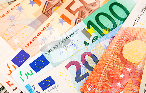 Image of Background from different euro banknotes close up