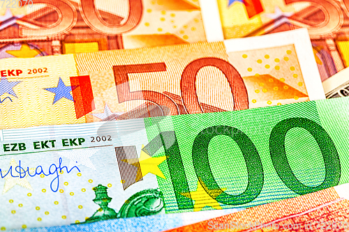 Image of Background from different euro banknotes close up