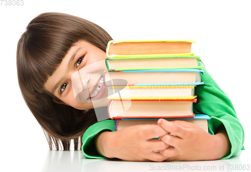 Image of Little girl with her books