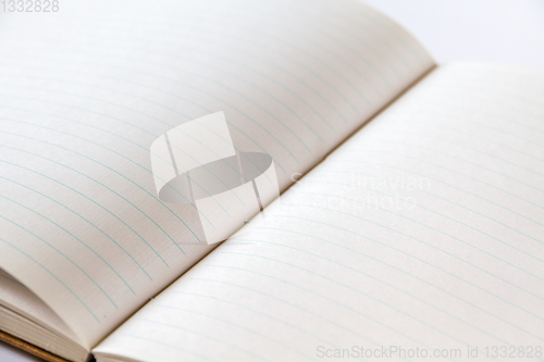 Image of Open blank notebook closeup view